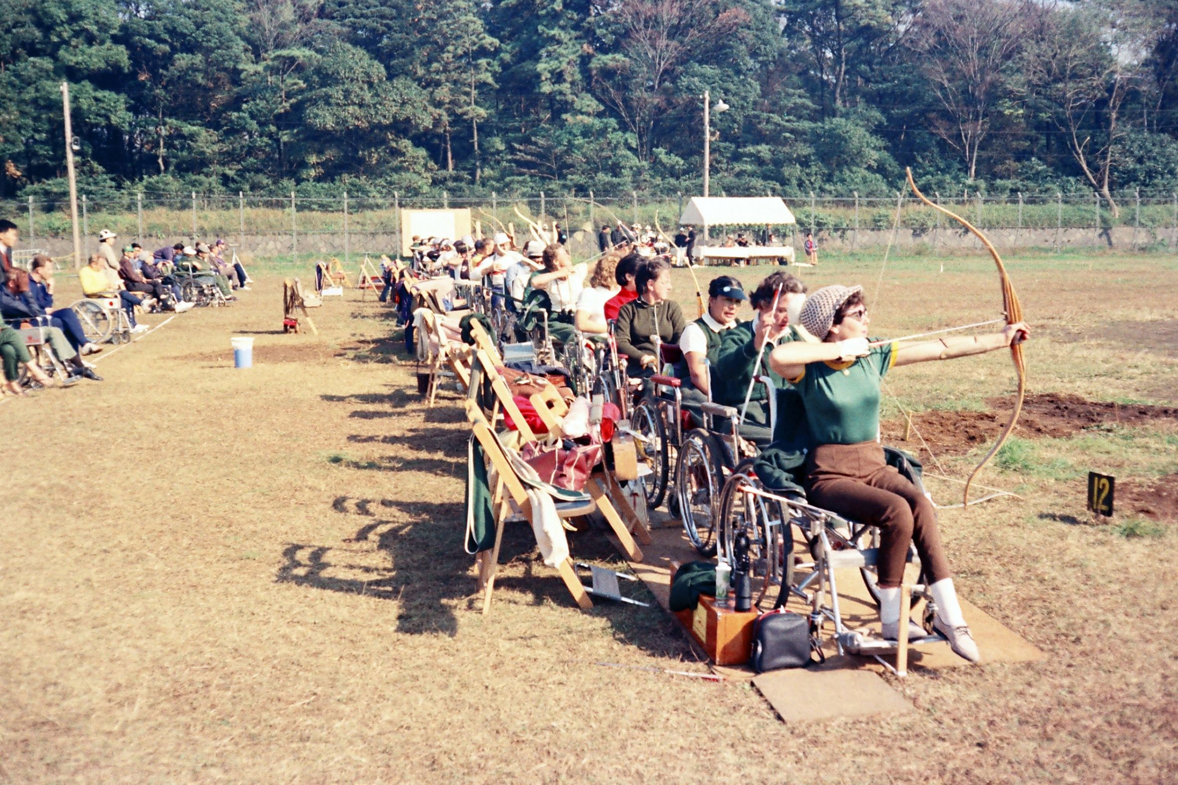 Daphne Ceeney (later Hilton) prepares to shoot during the archery competition at the 1964 Tokyo Paralympic Games.