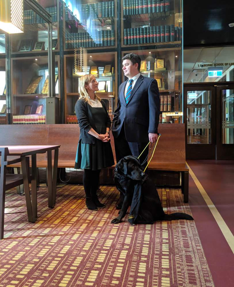 Associate Professor Harpur with his guide dog Sean and&amp;nbsp;colleague Dr Kathy Ellem.