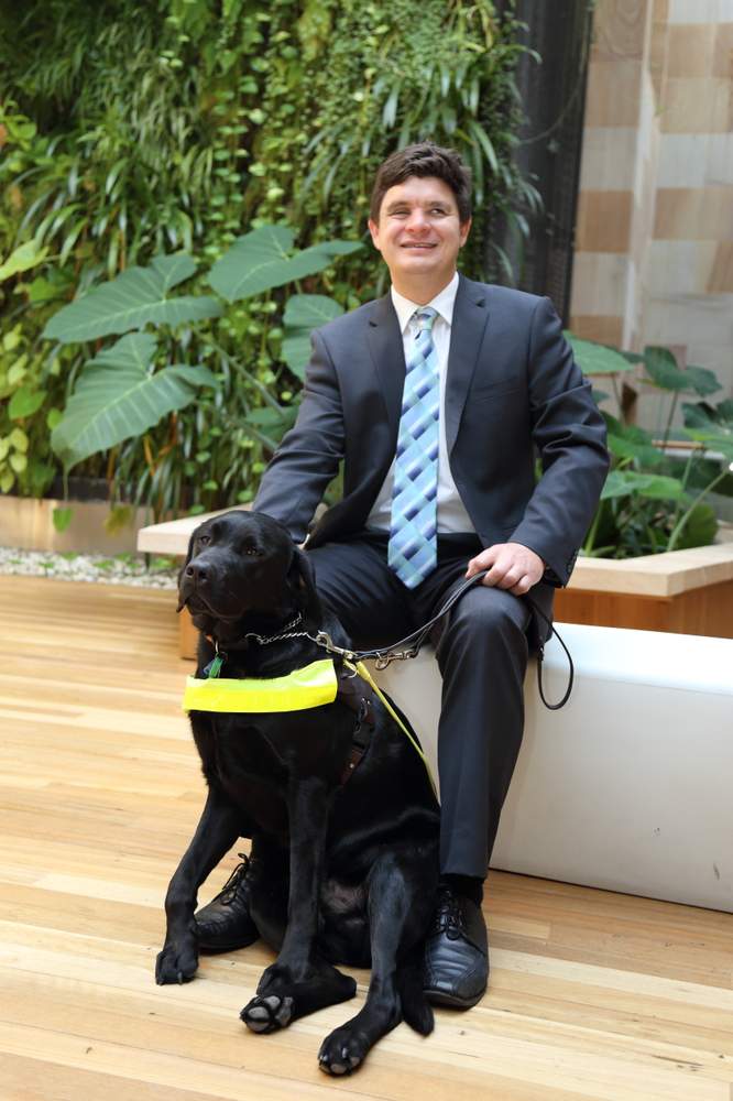 Associate Professor Paul Harpur with his late dog, Chester.