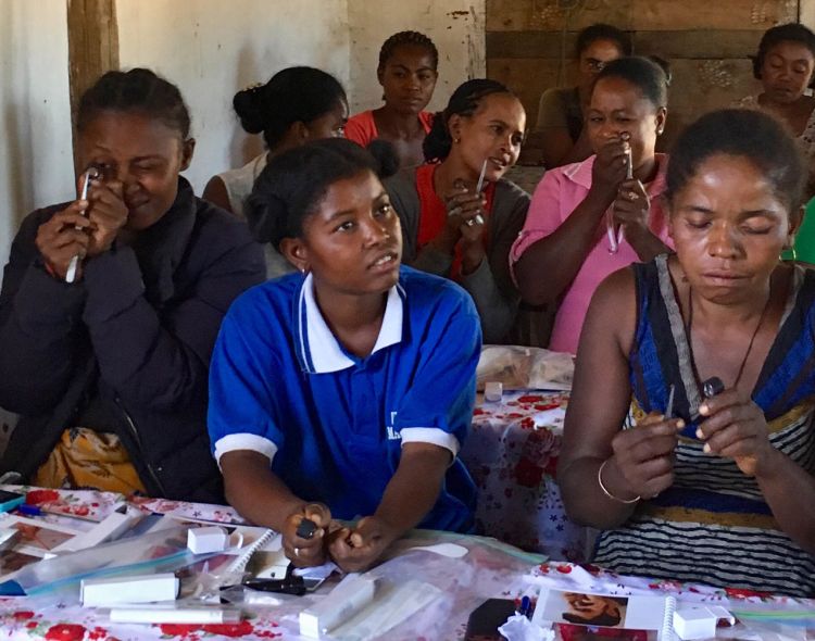 Young women in a field gemmology class