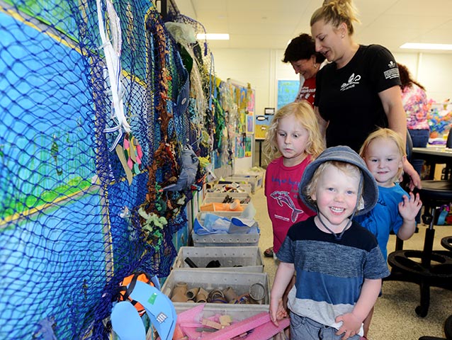 Children interact with a display at Moreton Bay Research Station