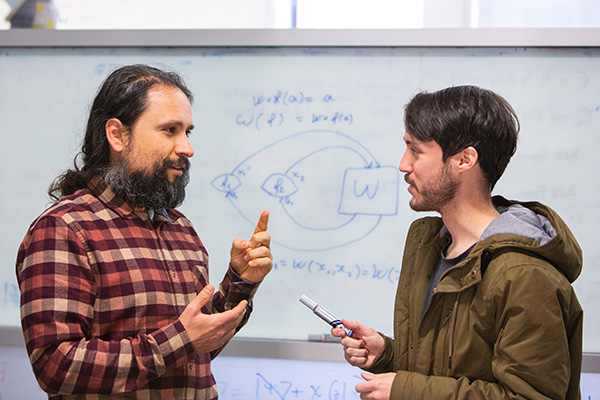 Image: Dr Fabio Costa (left) with Bachelor of Advanced Science (Honours) student Germain Tobar.