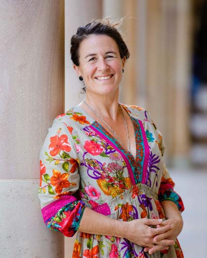 Franzisca Weder in front of a sustainability sign at UQ Sustainability Week