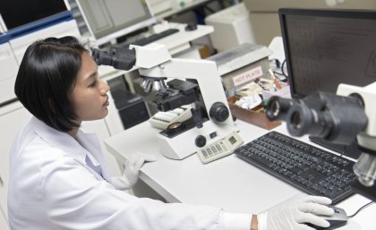 Woman at computer.