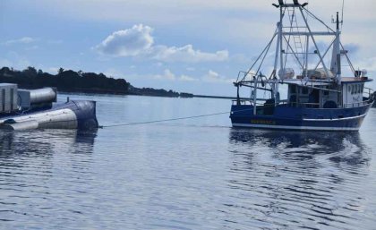 A tidal energy turbine being towed out to a site in the Tamar