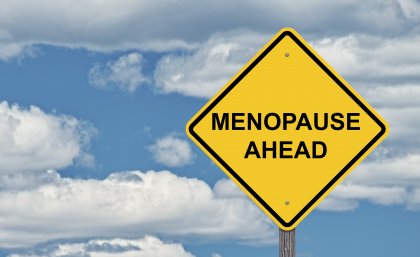 A road sign reads 'Menopause ahead'