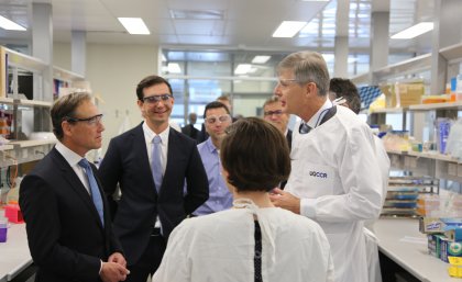 Professor David Paterson with Federal Minister Greg Hunt and others in the laboratory