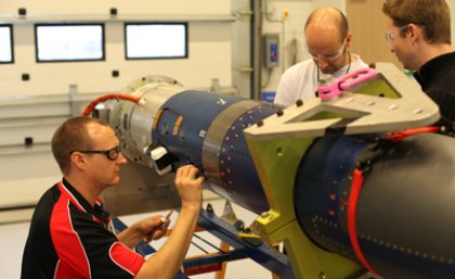 Brad Sharp, Dr Melrose Brown and Dr Michael Creagh from the SCRAMSPACE team work to finalise the payload for the upcoming launch. Credit: Donald Cook.