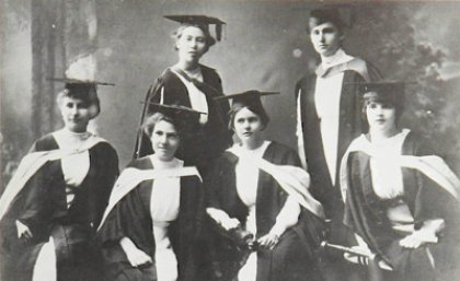 UQ graduates who completed their studies in 1913, pictured at their graduation ceremony the following year. Image courtesy of Fryer Library.