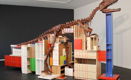 Claire Healy and Sean Cordeiro, ‘Future Remnant’ 2011, dinosaur fossil replica, IKEA furnishings, cable binding, 285 x 180 x 485 cm irreg. 
Courtesy of the artists and Nature Morte, Berlin and Gallery Barry Keldoulis, Sydney and © the artists