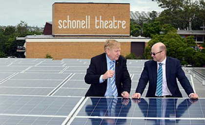 The federal Minister for Resources and Energy, Martin Ferguson, and Professor Paul Meredith at UQ's rooftop solar photovoltaic array