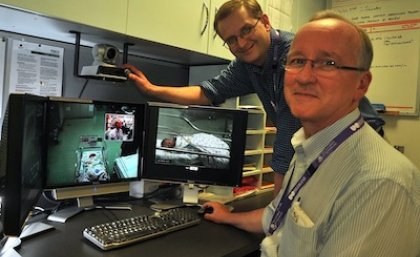 Award winning: Dr Nigel Armfield and Dr Tim Donovan have developed a telemedicine trial that enables specialists to assess sick infants in regional and country areas. Photo: Queensland Health