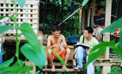 Jaime Manalo IV speaking to locals as part of his work with the Philippine Rice Research Institute. Photo provided by PhilRice/Al Benavente.