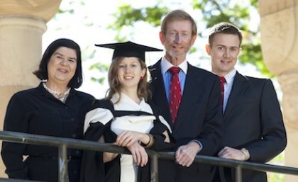 Family tradition: Elizabeth Mathews shares her graduation day joy with her parents Peter and Robyn-Ann and her brother James, who are all UQ alumni.