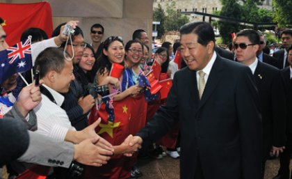 University of Queensland students meet His Excellency Mr Jia Qinglin, Chairman of the National Committee, Chinese People's Political Consultative Conference on his arrival at UQ