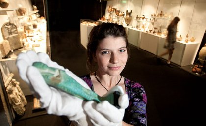 Classics and ancient history student Jessica Dowdell in the new temporary home for the UQ Antiquities Museum