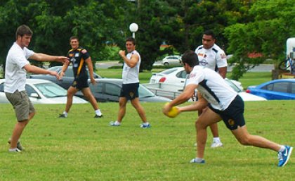 UQ Sport staff enjoy a game of touch football with Brisbane Broncos players UQ Sport staff enjoy a game of touch football with Brisbane Broncos players