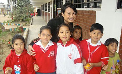 UQ student Winnie Van with school children from the Fey y Alegria School in Peru