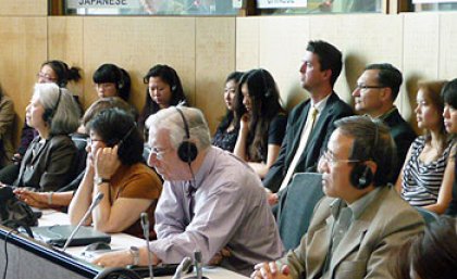 Guests listen to live interpreting in Japanese and Chinese at the opening of the newly refurbished JM Campbell Conference Facility Guests listen to live interpreting in Japanese and Chinese at the opening of the newly refurbished JM Campbell Conference Facility