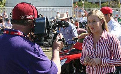 Industry Consultant Bruce Redman and journalism student Philippa Coore at the Ekka Industry Consultant Bruce Redman and journalism student Philippa Coore at the Ekka