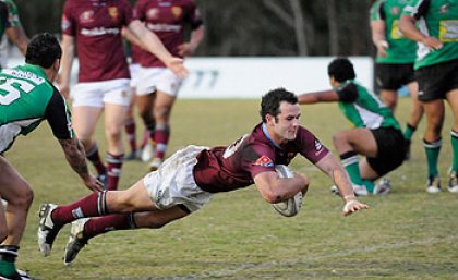UQ fly-half Jonathon Lance dives for the line against Sunnybank. Image: Tomme Hanson UQ fly-half Jonathon Lance dives for the line against Sunnybank. Image: Tomme Hanson