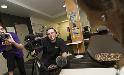 Journalisim students Kim Smith and Adam Evans interview Brenda Nadjiwan at World Press Freedom Day