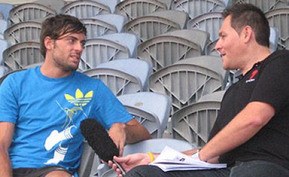 Mitchell Watt is interviewed by Channel 7 at the UQ Athletics Centre