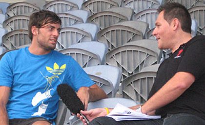Mitchell Watt is interviewed by Channel 7 at the UQ Athletics Centre Mitchell Watt is interviewed by Channel 7 at the UQ Athletics Centre