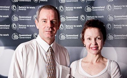 UQ Self-Insurance Manager Rod Knights and Ms Fraser with the award UQ Self-Insurance Manager Rod Knights and Ms Fraser with the award