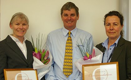 Sue Marshall and Jane Easson from the Occupational Health and Safety Unit with the Occupational Health and Safety Unit Director Gary Chaplin.