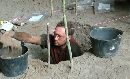  Dr Andy Fairbairn gets down and dirty on a dig.