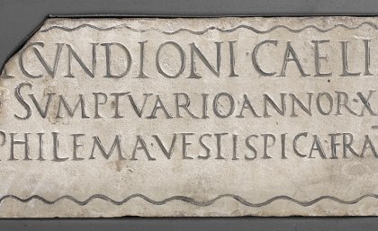 This ancient memorial tablet from a household slave will be part of the display. This ancient memorial tablet from a household slave will be part of the display.
