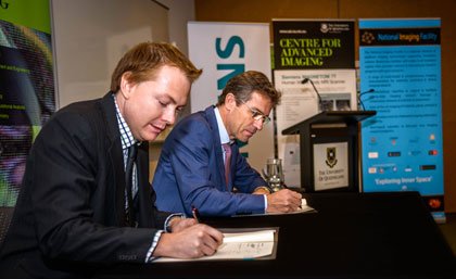 UQ Vice-Chancellor Professor Peter Høj and Toby Carrington, Vice President Finance for Siemens Healthcare in Australia and New Zealand.