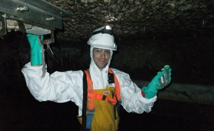 Dr Barry Cayford, who completed his PhD at UQ, at work on sewer research