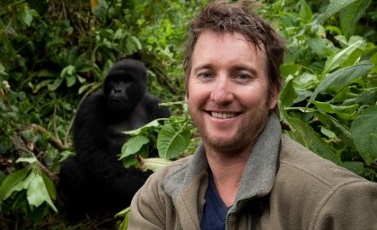 James Watson ... with a critically endangered mountain gorilla in east Africa. 