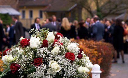 The public response to the death of two Sydney siege hostages has seen an outpouring of floral tributes.