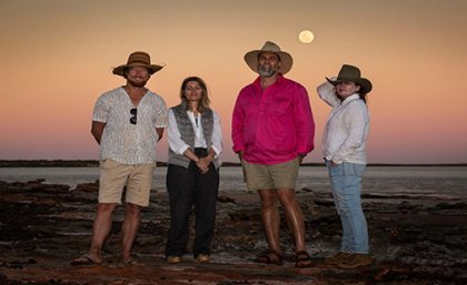 (L-R) Filmmaker Mark Jones, curator Marion Vasseur Raluy, UQ palaeontologist Dr Steve Salisbury and artist Angelika Markul, surrounded by dinosaur tracks on Roebuck Bay. Credit: Damian Kelly.  