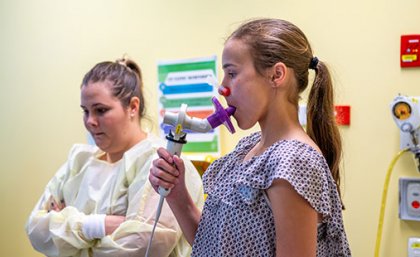 Mya Dunn performing a breathing exercise 