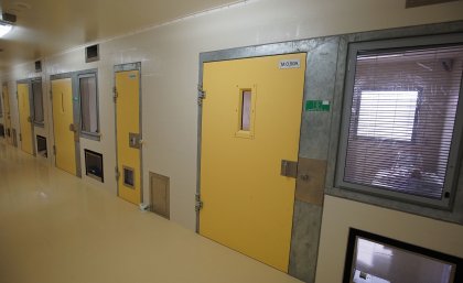 © 2017 Daniel Soekov for Human Rights Watch. A prisoner lies in his solitary confinement cell in the safety unit at Lotus Glen Correctional Centre, northern Queensland.