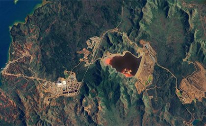 a satellite image of a nickel mine surrounded by trees