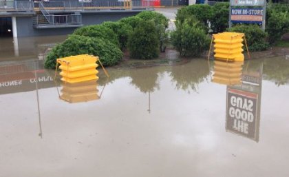 The Flood Tuff units in action protecting traffic management systems from flood waters. Image: TMR
