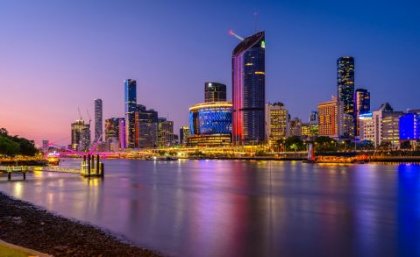 Image: Adobe. The Brisbane River and city skyline in the evening light