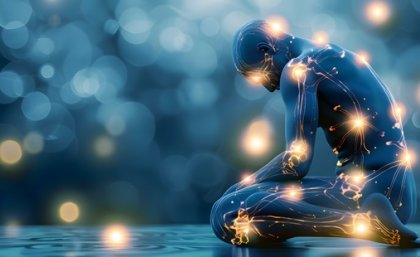 Image: Adobe Stock Graphic depicton of a person with fibromyalgia experiencing widespread pain and fatigue depicted as glowing points.