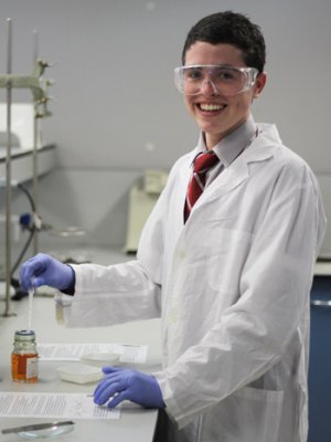 Oscar Saez from Clairvaux MacKillop College participates in the ‘Anodise, Polymerise and Photolyse’ chemistry workshop.