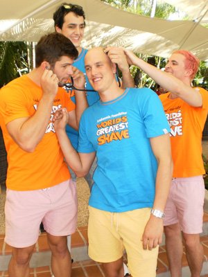 Team Maunder gets ready to "be brave and shave" in front of crowds at Regatta Hotel to raise funds for the World’s Greatest Shave campaign. (Left in orange, Kane Boucaut, back in blue, Louis Stephen, middle in blue John Maunder and right in orange Mac Alison.) Photo by Kate Bishop. Team Maunder gets ready to "be brave and shave" in front of crowds at Regatta Hotel to raise funds for the World’s Greatest Shave campaign. (Left in orange, Kane Boucaut, back in blue, Louis Stephen, middle in blue John Maunder and right in orange Mac Alison.) Photo by Kate Bishop.