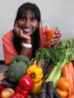 Dr Anneline Padayachee with orange carrot juice and other vegetables included in her research. Dr Anneline Padayachee with orange carrot juice and other vegetables included in her research.