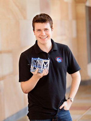 Michael Kehoe, UQ final year student of the School of Information Technology and Electrical Engineering. Pictured with his final year thesis project, a satellite that uses Android mobile phone technology as its on-board computer. Michael has recently completed a five week-internship with NASA. He has built a phonesat that will be launched by NASA into space on November 25. Michael Kehoe, UQ final year student of the School of Information Technology and Electrical Engineering. Pictured with his final year thesis project, a satellite that uses Android mobile phone technology as its on-board computer. Michael has recently completed a five week-internship with NASA. He has built a phonesat that will be launched by NASA into space on November 25.