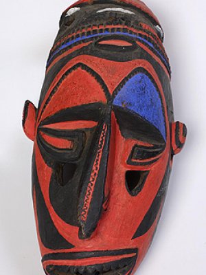 Carved female figure, before 1950, 240 x 30 x 35cm, wood, sago plant fibre, store bought paint
Morobe province, Papua New Guinea