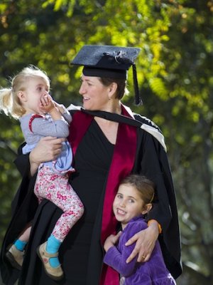 Family celebration: Naomi Smith shares her graduation day with her daughters, Chiara (5), and Allegra (2).