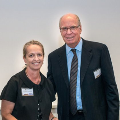 UQ Chancellor John Story congratulates Chancellor's Award winner Melissa Glendenning, Operations Manager at Queensland Alliance for Agriculture and Food Innovation.